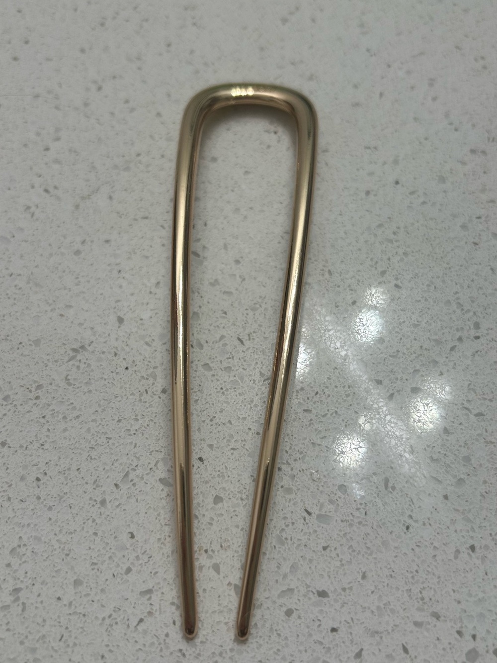 Kitsch gold tone metal hair pin accessory